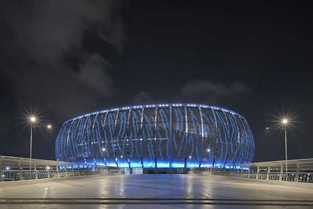 Exterior pixel and façade lighting transform the stadium into a vibrant community landmark.